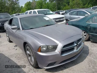 2013 Dodge Charger SE with VIN 2C3CDXBG3DH655523, listed as a IAAI auction lot 42003869 with 172,948 mi miles. Bid and sale history available at carsss.com. Image 1.