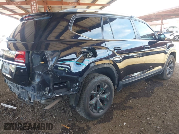 2018 Volkswagen Atlas SE with VIN 1V2CP2CA1JC600999, listed as a IAAI auction lot 42339421 with 133,490 mi miles and . Bid and sale history available at DreamBid. Image 4.