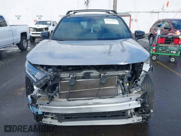 2021 Toyota RAV4 Hybrid XSE with VIN 4T3E6RFV1MU057532, listed as a IAAI auction lot 41713474 with 22,164 mi miles. Bid and sale history available at carsss.com. Image 13.