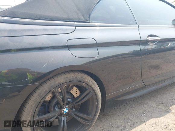 2014 BMW M6 z VIN WBSLZ9C5XEDZ78402, wystawiony jako IAAI lot #42399055 z przebiegiem 127 803 mil mil oraz . Historia ofert i sprzedaży dostępna na DreamBid. Obrazek 6.