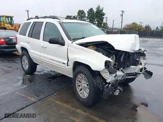 2004 Jeep Grand Cherokee Limited with VIN 1J4GW58S24C417604, listed as a IAAI auction lot 41578234 with 1 mi miles. Bid and sale history available at carsss.com. Image 1.