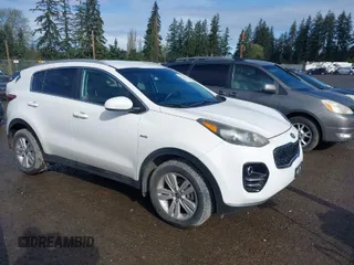 2017 Kia Sportage LX with VIN KNDPMCACXH7160726, listed as a IAAI auction lot 41974303 with 134,772 mi miles and . Bid and sale history available at DreamBid. Image 1.