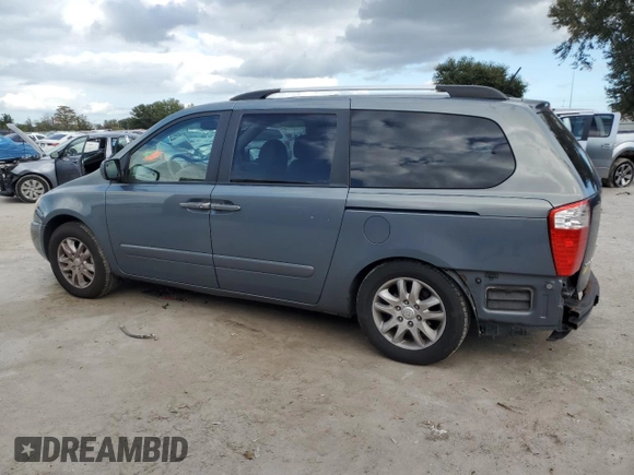 2009 Kia Sedona EX with VIN KNDMB233396299667, listed as a Copart auction lot 80186774 with 197,328 mi miles and Salvage Title. Bid and sale history available at carsss.com. Image 2.