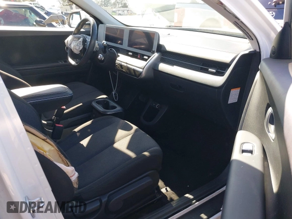 2023 Hyundai Ioniq 5 SE with VIN KM8KMDAF3PU176448, listed as a IAAI auction lot 42218598 with 65,321 mi miles and . Bid and sale history available at DreamBid. Image 5.