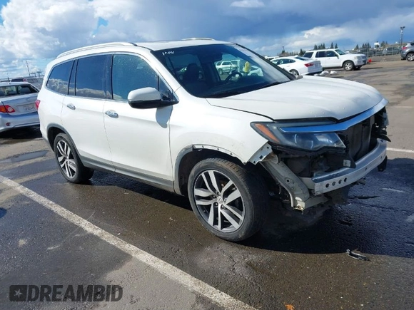 2017 Honda Pilot Elite with VIN 5FNYF6H06HB041609, listed as a IAAI auction lot 41804477 with 134,535 mi miles and . Bid and sale history available at DreamBid. Image 1.