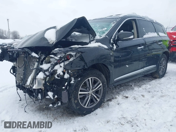 2016 Infiniti QX60 with VIN 5N1AL0MM9GC530142, listed as a IAAI auction lot 40989376 with 116,782 mi miles and . Bid and sale history available at DreamBid. Image 2.