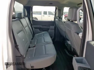 2023 Ford F-150 XL с VIN 1FTEW1CB7PKF35512, выставлен на аукционе Copart как лот 63042965 с пробегом 72 721 миль миль и Списание • Salvage title. История ставок и продаж доступна на DreamBid. Изображение 10.