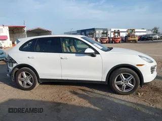 2014 Porsche Cayenne with VIN WP1AA2A23ELA97180, listed as a IAAI auction lot 42072423 with 143,374 mi miles and . Bid and sale history available at DreamBid. Image 14.