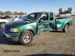 2000 Ford F-150 XL z VIN 1FTRX17W4YNB17453, wystawiony jako Copart lot #52051215 z przebiegiem Nie podano mil oraz Szkoda całkowita • Salvage title. Historia ofert i sprzedaży dostępna na DreamBid. Obrazek 1.