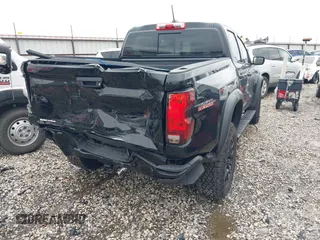 2024 Chevrolet Colorado 4WD Trail Boss with VIN 1GCPTEEK9R1310474, listed as a IAAI auction lot 42114233 with 4,970 mi miles and . Bid and sale history available at DreamBid. Image 4.