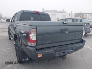 2009 Toyota Tacoma z VIN 5TELU42N39Z610375, wystawiony jako IAAI lot #41671324 z przebiegiem 170 320 mil mil oraz . Historia ofert i sprzedaży dostępna na DreamBid. Obrazek 3.