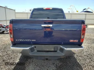 2012 GMC Canyon SLE1 with VIN 1GTH6MFE3C8144532, listed as a Copart auction lot 74084274 with 115,429 mi miles and Clean Title. Bid and sale history available at carsss.com. Image 6.