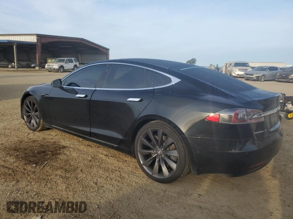 2017 Tesla Model S 100D with VIN 5YJSA1E27HF185487, listed as a Copart auction lot 47979455 with 184,987 mi miles and Salvage Title. Bid and sale history available at DreamBid. Image 2.