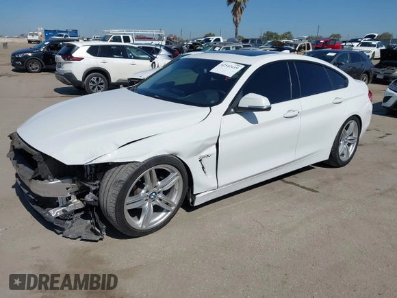 2015 BMW 4 Series 428i with VIN WBA4A9C50FGL85857, listed as a IAAI auction lot 42542619 with 136,411 mi miles and . Bid and sale history available at DreamBid. Image 2.