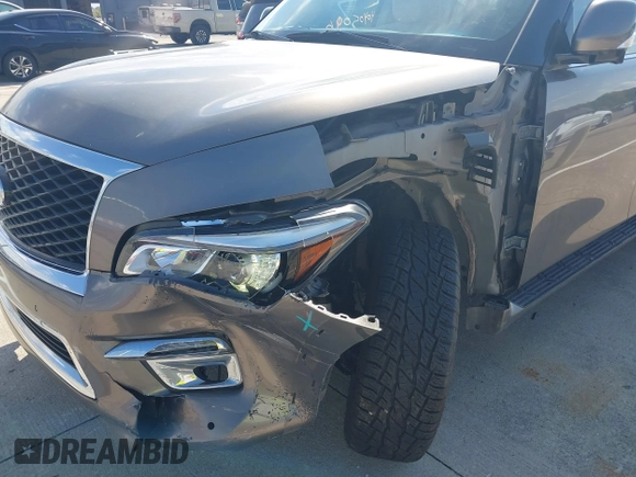 2015 Infiniti QX80 z VIN JN8AZ2NC8F9370971, wystawiony jako IAAI lot #40405096 z przebiegiem 71 990 mil mil oraz . Historia ofert i sprzedaży dostępna na DreamBid. Obrazek 6.