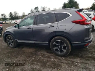 2017 Honda CR-V Touring with VIN 2HKRW2H90HH657450, listed as a Copart auction lot 52821895 with 154,801 mi miles and Salvage Title. Bid and sale history available at carsss.com. Image 2.