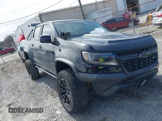 2017 Chevrolet Colorado 4WD ZR2 z VIN 1GCGTEEN9H1290980, wystawiony jako IAAI lot #41723014 z przebiegiem 142 707 mil mil oraz . Historia ofert i sprzedaży dostępna na DreamBid. Obrazek 1.