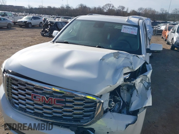 2020 GMC Yukon XL Denali with VIN 1GKS1HKJ6LR282854, listed as a IAAI auction lot 41717072 with 56,715 mi miles and . Bid and sale history available at DreamBid. Image 10.