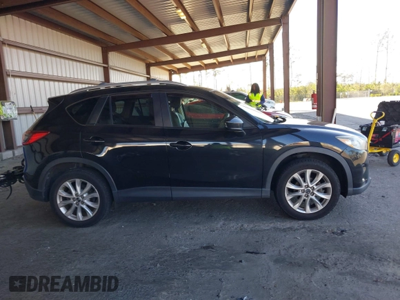 2013 Mazda CX-5 Grand Touring with VIN JM3KE2DE4D0127827, listed as a IAAI auction lot 41817214 with 108,295 mi miles. Bid and sale history available at carsss.com. Image 13.