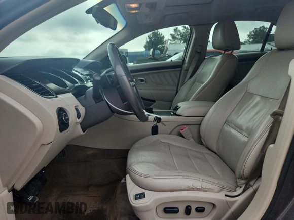2011 Ford Taurus Limited z VIN 1FAHP2JW1BG156691, wystawiony jako Copart lot #59811755 z przebiegiem 162 828 mil mil oraz Szkoda całkowita • Salvage title. Historia ofert i sprzedaży dostępna na DreamBid. Obrazek 7.