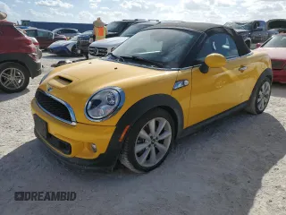 2015 MINI Roadster S z VIN WMWSY3C53FT595389, wystawiony jako Copart lot #77476814 z przebiegiem Nie podano mil oraz Szkody całkowita. Historia ofert i sprzedaży dostępna na DreamBid. Obrazek 1.