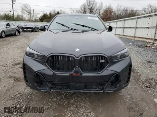 2025 BMW X6 M60i with VIN 5UX43EX02S9W76491, listed as a Copart auction lot 85033264 with 5,173 mi miles and Salvage Title. Bid and sale history available at carsss.com. Image 5.
