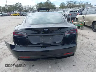 2023 Tesla Model S with VIN 5YJSA1E52PF500088, listed as a IAAI auction lot 41372918 with Not provided miles and . Bid and sale history available at DreamBid. Image 17.