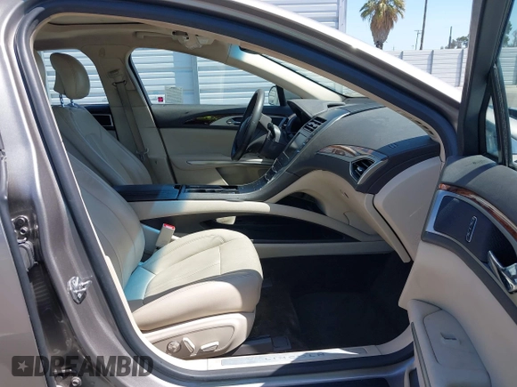 2016 Lincoln MKZ Hybrid with VIN 3LN6L2LU8GR613310, listed as a IAAI auction lot 41986892 with 114,087 mi miles. Bid and sale history available at carsss.com. Image 5.