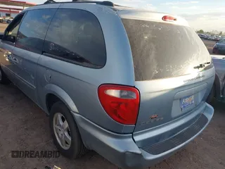 2005 Dodge Caravan SXT with VIN 2D4GP44L55R483006, listed as a IAAI auction lot 42636765 with 307,331 mi miles and . Bid and sale history available at DreamBid. Image 3.