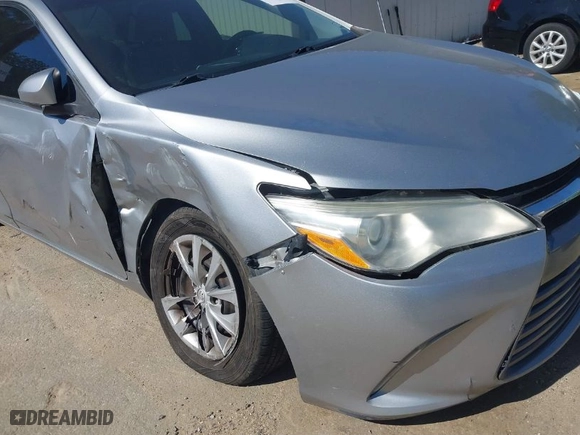 2015 Toyota Camry XLE with VIN 4T4BF1FK9FR499888, listed as a IAAI auction lot 41676657 with 148,310 mi miles. Bid and sale history available at carsss.com. Image 11.