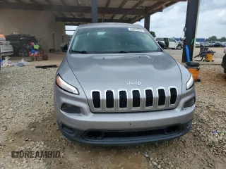 2016 Jeep Cherokee Sport with VIN 1C4PJLAB0GW106601, listed as a Copart auction lot 60854675 with 58,557 mi miles and Salvage title. Bid and sale history available at DreamBid. Image 5.