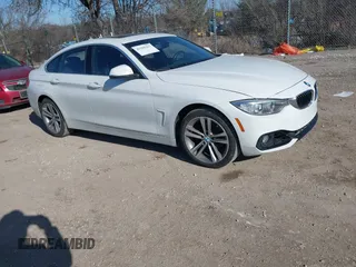 2016 BMW 4 Series 428i xDrive with VIN WBA4C9C59GG138090, listed as a IAAI auction lot 41560267 with 94,010 mi miles and . Bid and sale history available at carsss.com. Image 1.