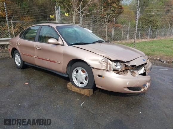 1997 Ford Taurus GL z VIN 1FALP52U2VA273762, wystawiony jako IAAI lot #41956536 z przebiegiem 177 340 mil mil oraz . Historia ofert i sprzedaży dostępna na DreamBid. Obrazek 1.