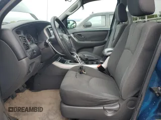 2005 Mazda Tribute i with VIN 4F2YZ02ZX5KM17738, listed as a Copart auction lot 72346384 with 203,245 mi miles and Salvage Title. Bid and sale history available at carsss.com. Image 7.