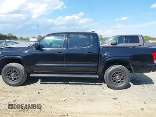 2016 Toyota Tacoma SR5 with VIN 5TFAX5GN4GX060296, listed as a IAAI auction lot 42158554 with 219,859 mi miles and . Bid and sale history available at DreamBid. Image 14.