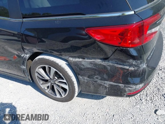 2021 Honda Odyssey Touring with VIN 5FNRL6H84MB027396, listed as a IAAI auction lot 42616650 with 67,207 mi miles and . Bid and sale history available at DreamBid. Image 18.