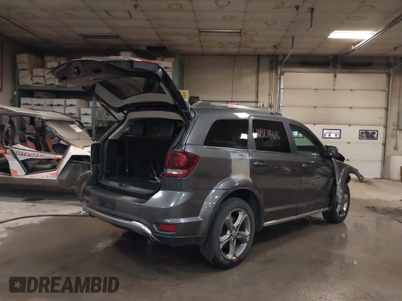 2015 Dodge Journey Crossroad with VIN 3C4PDDGG0FT607072, listed as a IAAI auction lot 41881868 with 185,699 mi miles. Bid and sale history available at carsss.com. Image 4.