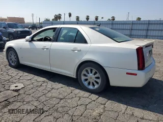 2006 Cadillac STS z VIN 1G6DW677560132284, wystawiony jako Copart lot #55707415 z przebiegiem 329 037 mil mil oraz Czysty tytuł • Clean title. Historia ofert i sprzedaży dostępna na DreamBid. Obrazek 2.