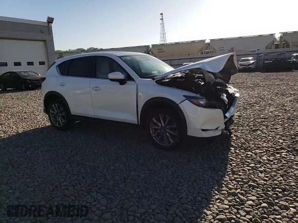2020 Mazda CX-5 Grand Touring with VIN JM3KFBDM5L1851734, listed as a Copart auction lot 56729585 with 39,023 mi miles and Salvage title. Bid and sale history available at DreamBid. Image 14.
