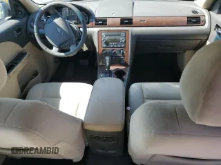 2008 Ford Taurus SEL z VIN 1FAHP24W88G144977, wystawiony jako Copart lot #52887835 z przebiegiem 164 530 mil mil oraz Szkody całkowita. Historia ofert i sprzedaży dostępna na DreamBid. Obrazek 8.