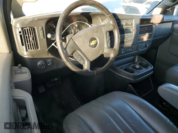 2021 Chevrolet Express Cargo with VIN 1GCWGBFP6M1268993, listed as a Copart auction lot 79764904 with 66,600 mi miles and Salvage title. Bid and sale history available at DreamBid. Image 8.