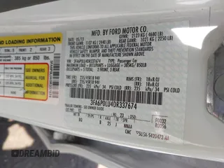 2013 Ford Fusion SE Hybrid with VIN 3FA6P0LU4DR337674, listed as a IAAI auction lot 42164262 with 150,902 mi miles and . Bid and sale history available at carsss.com. Image 9.
