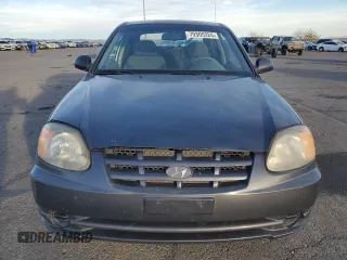 2005 Hyundai Accent GLS with VIN KMHCG35C65U359247, listed as a Copart auction lot 79305324 with 120,985 mi miles and Salvage Title. Bid and sale history available at carsss.com. Image 5.