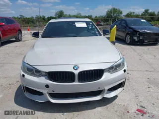 2015 BMW 4 Series 428i xDrive with VIN WBA3N5C58FK198825, listed as a IAAI auction lot 41919172 with 125,421 mi miles. Bid and sale history available at carsss.com. Image 12.