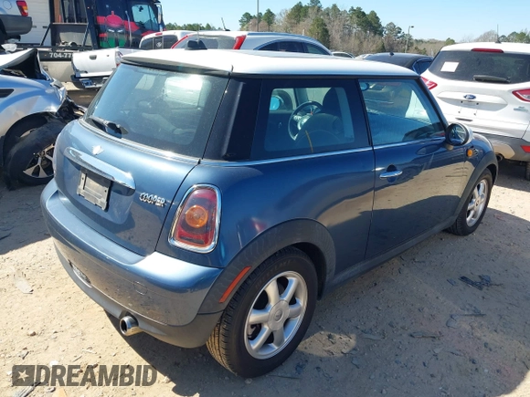 2009 MINI Cooper Hardtop with VIN WMWMF33549TW79871, listed as a IAAI auction lot 41844591 with 236,255 mi miles. Bid and sale history available at carsss.com. Image 4.