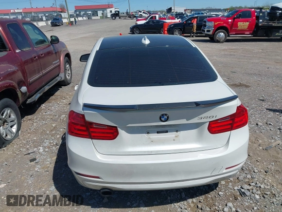 2014 BMW 3 Series 320i with VIN WBA3B1C51EK132083, listed as a IAAI auction lot 41985295 with 158,626 mi miles. Bid and sale history available at carsss.com. Image 12.