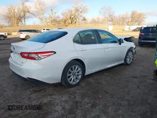 2019 Toyota Camry LE z VIN 4T1B11HK1KU804266, wystawiony jako IAAI lot #41226403 z przebiegiem 91 163 mil mil oraz . Historia ofert i sprzedaży dostępna na DreamBid. Obrazek 4.