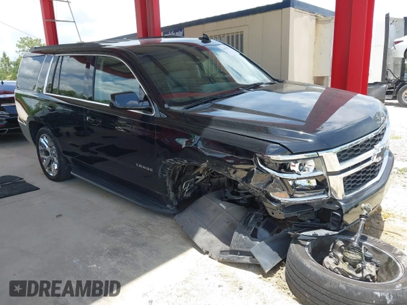 2019 Chevrolet Tahoe LT z VIN 1GNSKBKCXKR361392, wystawiony jako IAAI lot #42661332 z przebiegiem 112 973 mil mil oraz . Historia ofert i sprzedaży dostępna na DreamBid. Obrazek 1.