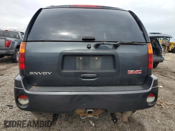 2006 GMC Envoy SLT with VIN 1GKDT13S762238764, listed as a Copart auction lot 51815715 with 302,598 mi miles and Salvage Title. Bid and sale history available at carsss.com. Image 6.