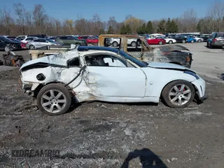 2003 Nissan 350Z Enthusiast with VIN JN1AZ34D83T117940, listed as a IAAI auction lot 41842690 with 165,379 mi miles. Bid and sale history available at carsss.com. Image 13.